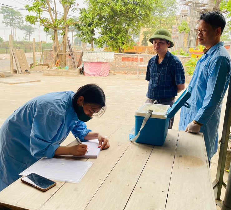 Phúc Thọ đạt 100% kế hoạch tiêm phòng vắc xin cho đàn vật nuôi- Ảnh 4.