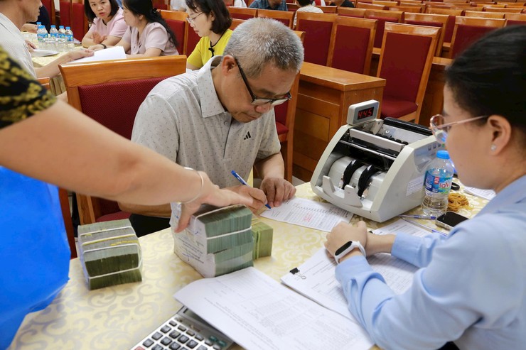 Phường Dương Nội chi trả bồi thường, hỗ trợ giải phóng mặt bằng Dự án nâng cấp, mở rộng Quốc lộ 6 đoạn Ba La - Xuân Mai- Ảnh 3.