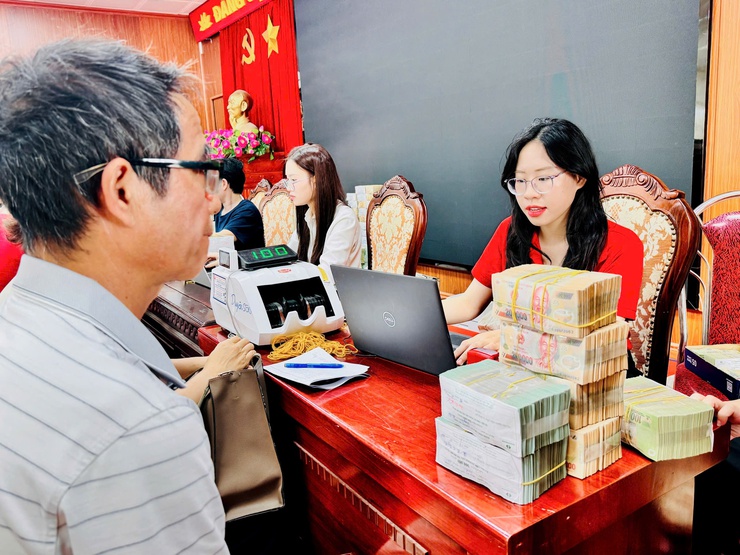 Xã Nam Phù: Người dân đồng thuận nhận bồi thường, bàn giao mặt bằng Dự án khu đô thị thể thảo Olympic- Ảnh 2.