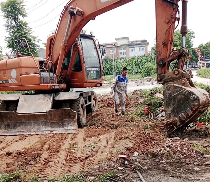 Quốc Oai quyết liệt xóa “điểm đen” rác thải, lan tỏa ý thức bảo vệ môi trường trong cộng đồng- Ảnh 1.