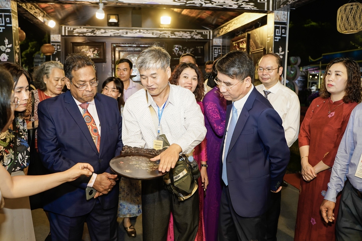 Hà Nội đón nhận danh hiệu "Thành viên mạng lưới các thành phố thủ công sáng tạo thế giới" của hai làng nghề Chuyên Mỹ và Sơn Đồng- Ảnh 11.