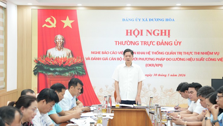 Thường trực Đảng uỷ xã nghe cáo báo công tác triển khai hệ thống OKR/KPI trên không gian làm việc số HanoiWork - Ảnh 7.