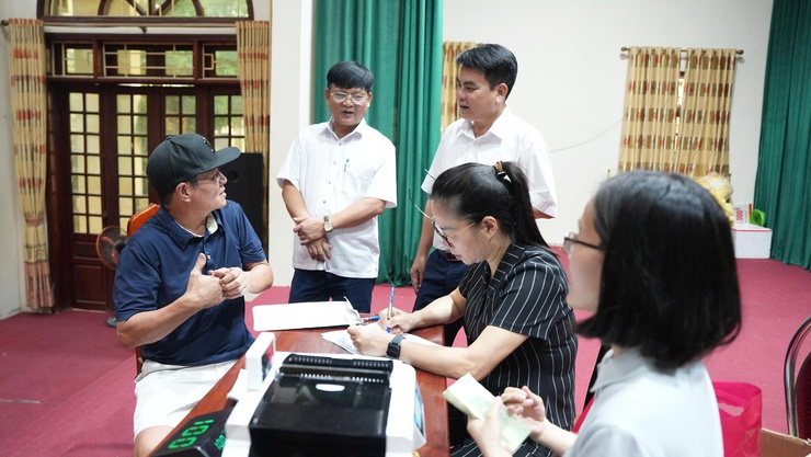 Chi trả trên 12,9 tỷ đồng cho 40 hộ dân phục vụ giải phóng mặt bằng dự án Cụm Công nghiệp Dương Liễu - Giai đoạn 2- Ảnh 2.