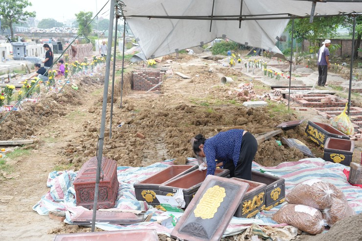 Đẩy nhanh tiến độ di chuyển mồ mả, bàn giao mặt bằng thực hiện dự án Khu đô thị thể thao Quốc tế Hà Nội- Ảnh 5.