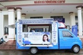 Chuyến xe lưu động đưa dịch vụ công về tận thôn xóm với đồng bào