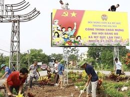 Hội Nông dân Mỹ Đức xây dựng vườn hoa và pa-nô chào mừng Đại hội Đảng