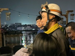 Kịp thời giải cứu cô gái trẻ “chênh vênh” trên tầng 9
