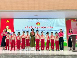 Rạng rỡ sắc đỏ khăn quàng trong ngày chào mừng kỉ niệm thành lập quân đội việt năm 22/12 tại Trường Tiểu học Bùi Quốc Khái