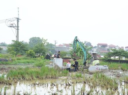 Đẩy nhanh tiến độ di chuyển mồ mả, bàn giao mặt bằng thực hiện dự án Khu đô thị thể thao Quốc tế Hà Nội