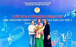 Nguyễn Hoài Bảo An - cô học trò nhỏ say mê đàn tranh của trường THCS Hoàng Liệt