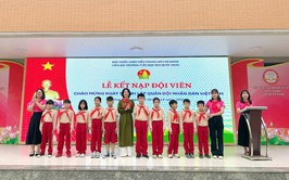 Rạng rỡ sắc đỏ khăn quàng trong ngày chào mừng kỉ niệm thành lập quân đội việt năm 22/12 tại Trường Tiểu học Bùi Quốc Khái