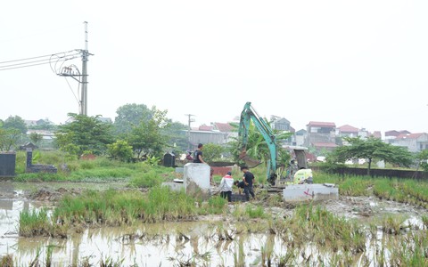Đẩy nhanh tiến độ di chuyển mồ mả, bàn giao mặt bằng thực hiện dự án Khu đô thị thể thao Quốc tế Hà Nội